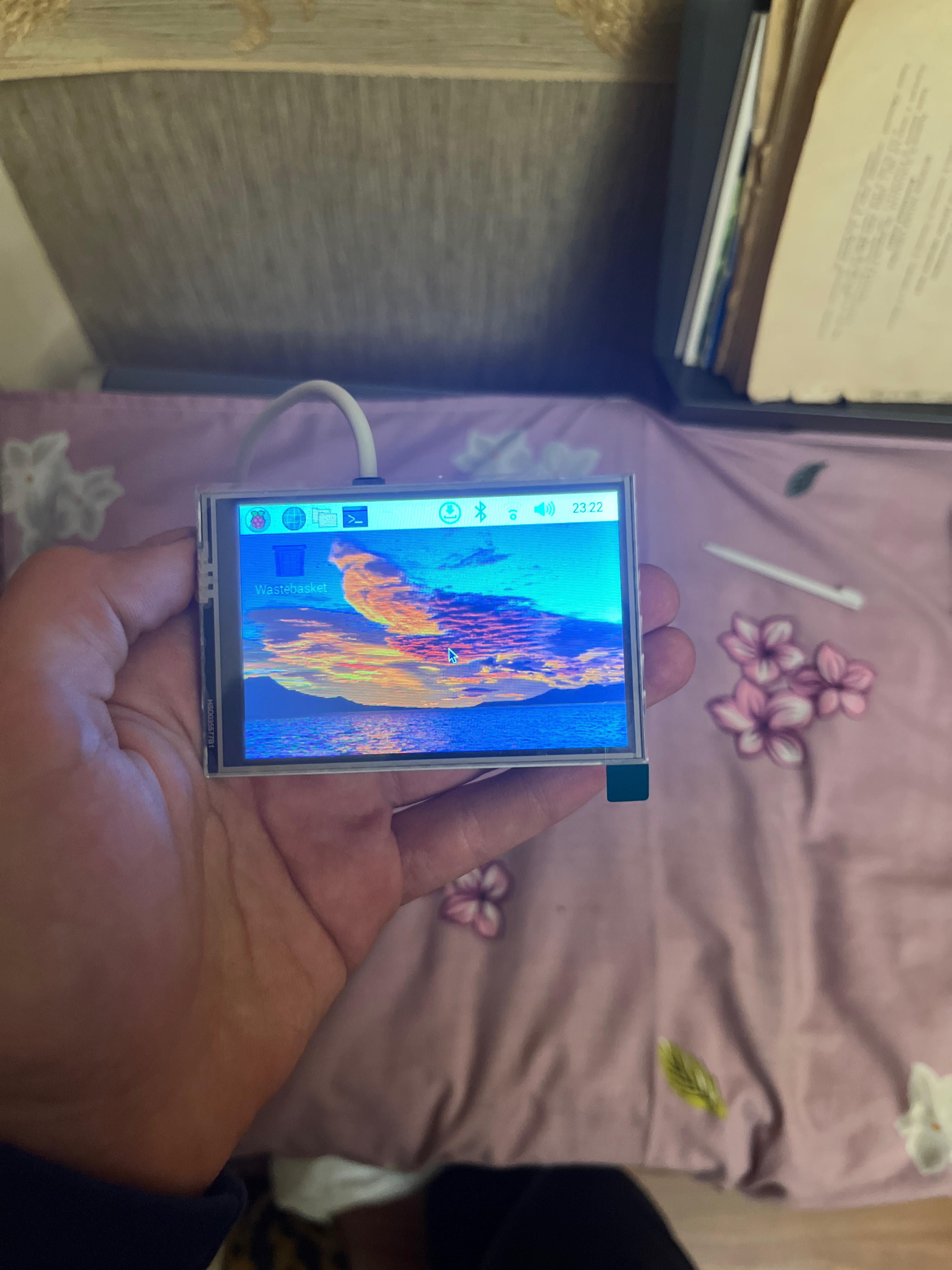 ActiView prototype held in hand during a screen and interface test