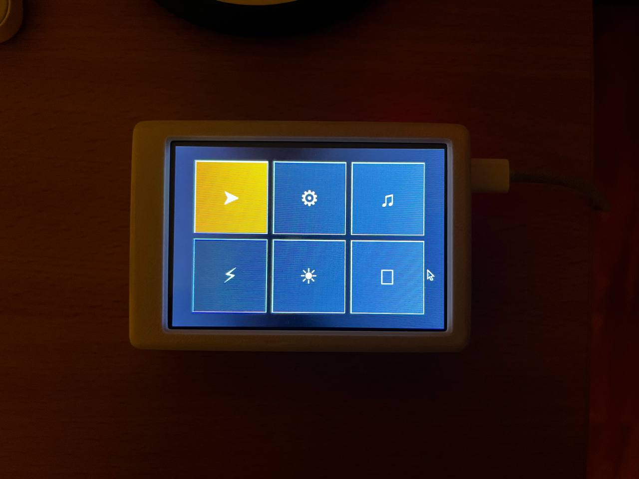 ActiView prototype in a protective case showing the menu interface